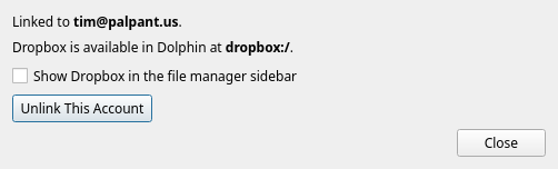 The Dropbox page in System Settings, showing a linked account